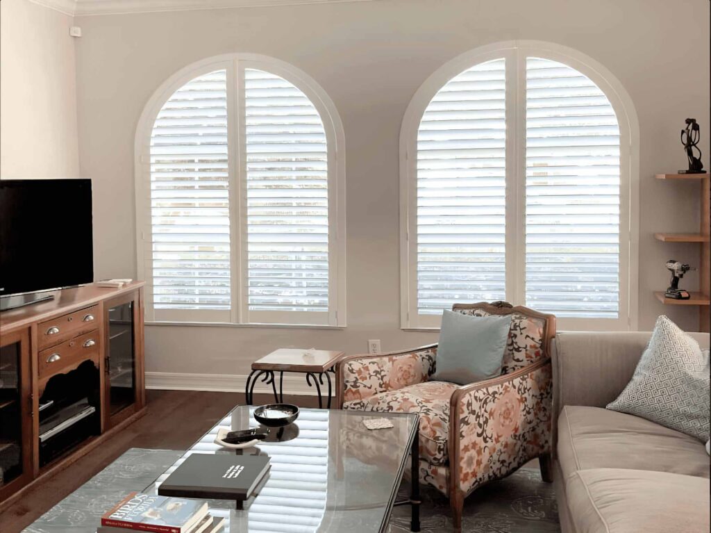 White Arched Shutters in Living Room